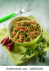 oat with peas carrots and hot chili pepper, selective focus