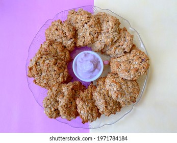 Oatmeal Cookies, Cooking At Home, Healthy Food, Round Shape, Yellow-purple Background. Blueberry Sauce In Small Cup Pink