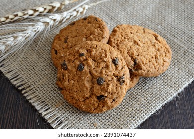 oatmeal cookies on the burlap texture decorated with wheat ears   - Powered by Shutterstock