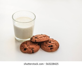 Oatmeal Cookies On A White Background Glass Of Milk And A Glass