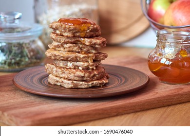 Oatmeal Pancakes With Wholemeal Flour And Apples. Decor The Apricot Jam.