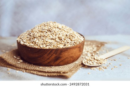 Oats in wooden bowl . Healthy food - Powered by Shutterstock