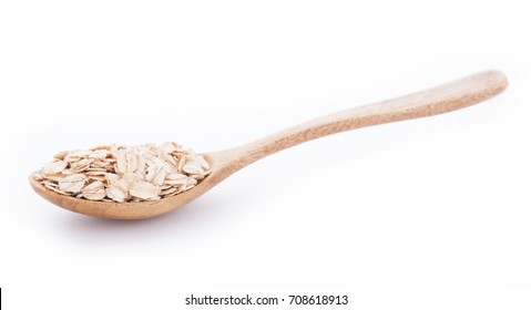 Oats In Wooden Spoon On White Background