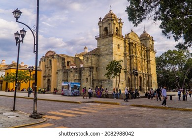 Oaxaca, Mexico - November 11, 2021 - Street Photography Of People At The Metropolitan Cathedral On The Zocalo Square At Sunset