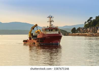 Oban Scotland UK - August 3 2019: Aquaculture Support Vessel Gina Mary Owned By Inverlussa Marine Services Sailing Into Oban Harbour, Scotland