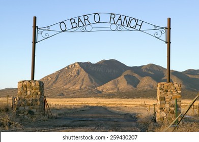 O'Bar'o Ranch gate and mountains at sunset in central New Mexico, Route 48 near Smokey Bear Historical Park