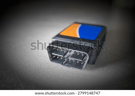 An OBD II scanner designed to read error codes from a car