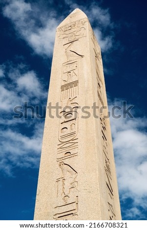 Obelisk of Theodosius, Istanbul, Turkey. Ancient Egyptian stone monument with hieroglyphic letter, historic landmark of Istanbul, located on formerly Constantinople Hippodrome. Sightseeing concept.