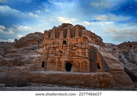 Obelisk Tomb and Bab as-Siq Triclinium , stone rock historic sight in Petra. Travel Jordan, Arabia holiday. Evening light in nature, Jordan. Red landscape archaeological site, Petra in Jordan. Arabia.