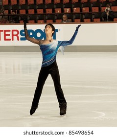 OBERSTDORF, GERMANY - SEPT 22: Figure Skater Yuzuru Hanyu Of Japan Performs His Short Program At Nebelhorn Trophy On September 22, 2011 In Oberstdorf, Germany