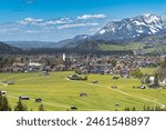 Oberstdorf on the background of the snowy Alps in April