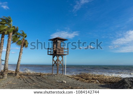 Obervation post and garbage on the beach.