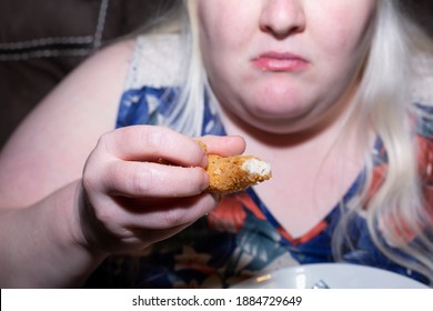 Obese, Albino Woman Eating A Fried Chicken Tender