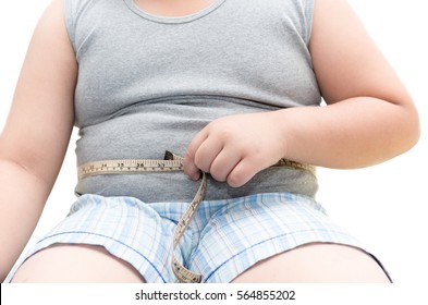 Obese fat boy measuring his belly with measurement tape, unhealthy concept