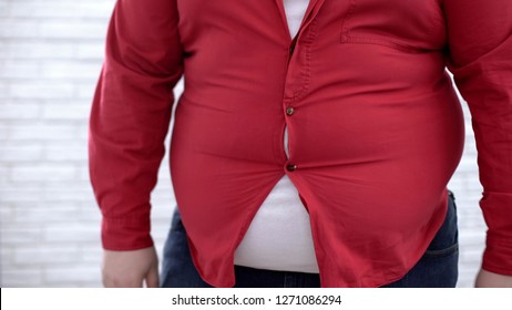 Obese Man Wearing Tight Red Shirt, Oversize Clothing Problem, Insecurities