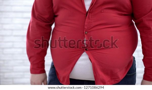 fat man in tight t shirt