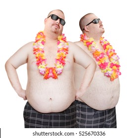 Obese men's couple in swimsuit with tropical flowers. Funny people enjoying holidays on the beach. Studio shot of two persons (only one same man in different positions) on white background.