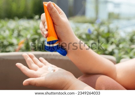 Obese Woman applying sunscreen cream Vacation Traveling with Body Sun protection suncream in hotel resort holiday.