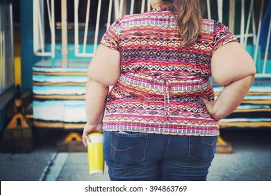 Obese Woman At A Carnival