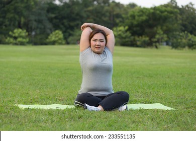 Obese Woman Cooling Down After Finished Her Workout.