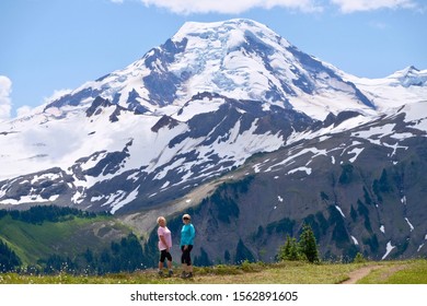 Obese Women Trying To Loose Weight Hiking In Mountains. Mount Baker National Forest. Washington  State. USA