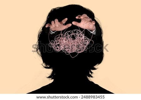 Obeying master  hand pulling the strings in the silhouette of a human head. Concept of mental health, emotional manipulation, world conspiracy theories., control and dictatorship