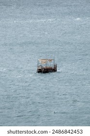 Object at the middle of atlantic ocean, view from cerro avanzado viewpoint, punta loma peninsula, puerto madryn, chubut province, argentina