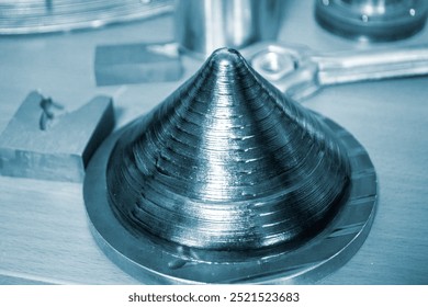 Object printed by 3D printer from metal. Additive manufacturing solution. Object created on 3Dprinter from melting metal thread. 3D Metal Printing. Metal additive manufacturing