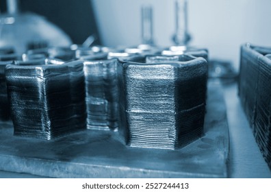 Object printed by 3D printer from metal. Additive manufacturing solution. Object created on 3Dprinter from melting metal thread. 3D Metal Printing. Metal additive manufacturing