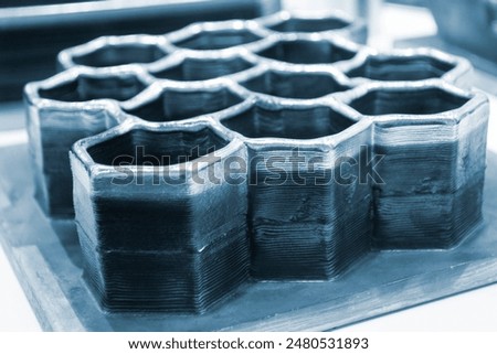 Object printed by 3D printer from metal. Additive manufacturing solution. Object created on 3Dprinter from melting metal thread. 3D Metal Printing. Metal additive manufacturing