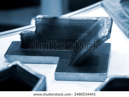 Object printed by 3D printer from metal. Additive manufacturing solution. Object created on 3Dprinter from melting metal thread. 3D Metal Printing. Metal additive manufacturing