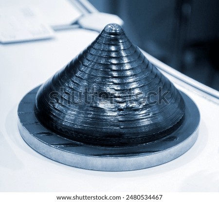 Object printed by 3D printer from metal. Additive manufacturing solution. Object created on 3Dprinter from melting metal thread. 3D Metal Printing. Metal additive manufacturing