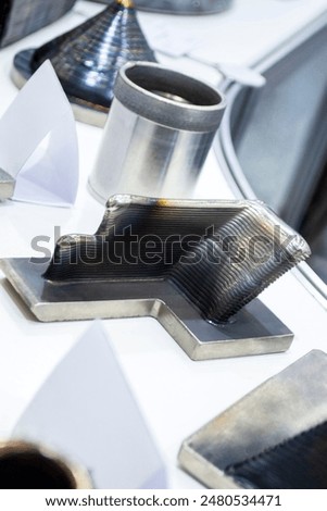 Object printed by 3D printer from metal. Additive manufacturing solution. Object created on 3Dprinter from melting metal thread. 3D Metal Printing. Metal additive manufacturing