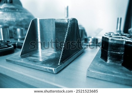 Object printed by 3D printer from metal. Additive manufacturing solution. Object created on 3Dprinter from melting metal thread. 3D Metal Printing. Metal additive manufacturing