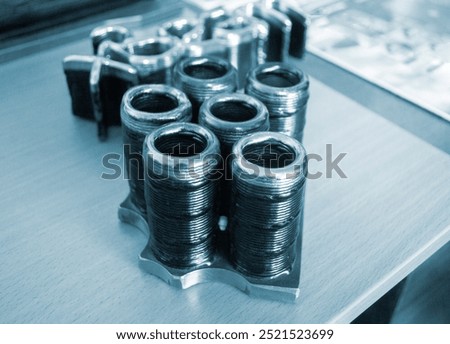 Object printed by 3D printer from metal. Additive manufacturing solution. Object created on 3Dprinter from melting metal thread. 3D Metal Printing. Metal additive manufacturing