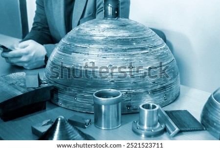 Object printed by 3D printer from metal. Additive manufacturing solution. Object created on 3Dprinter from melting metal thread. 3D Metal Printing. Metal additive manufacturing
