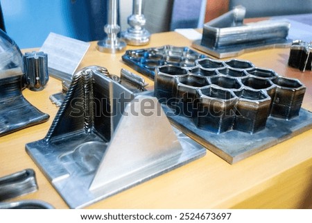 Object printed by 3D printer from metal. Additive manufacturing solution. Object created on 3Dprinter from melting metal thread. 3D Metal Printing. Metal additive manufacturing