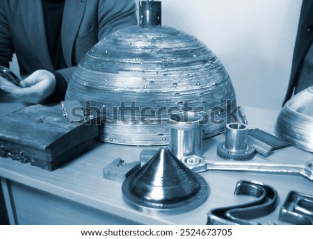 Object printed by 3D printer from metal. Additive manufacturing solution. Object created on 3Dprinter from melting metal thread. 3D Metal Printing. Metal additive manufacturing