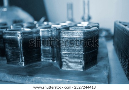 Object printed by 3D printer from metal. Additive manufacturing solution. Object created on 3Dprinter from melting metal thread. 3D Metal Printing. Metal additive manufacturing