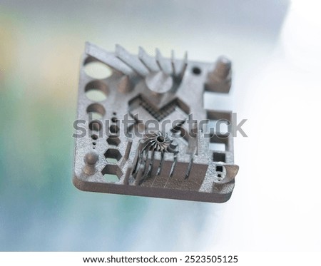 Object printed on 3D printer from metal powder using Metal Jet technology. High detailed detailing parts. Metal Jet. 3D-printed metal parts. Modern 3D printing, additive manufacturing technologies