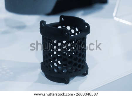 Object printed on 3D printer from molten plastic powder close-up. Model printed on 3D printer from melted polyamide powder. New modern additive 3D printing technology. Multi Jet Fusion MJF technology