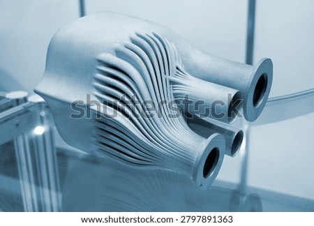 Object printed on 3D printer. Turbine impeller. Model printed on 3D printer from metal powder. Stainless steel alloy 316L. Selective Laser Melting. SLM. Additive manufacturing. 3D printing technology