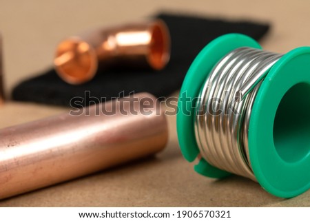 Objects of home heating system: copper plumbing parts, gas soldering