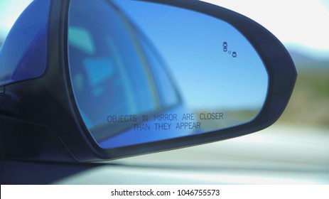 Objects In Mirror Are Closer Than They Appear 