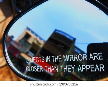 Objects In The Mirror Are Closer Than They Appear.