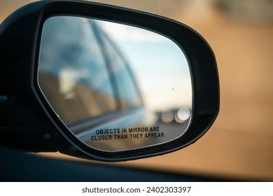 Objects in mirror are closer than they appear