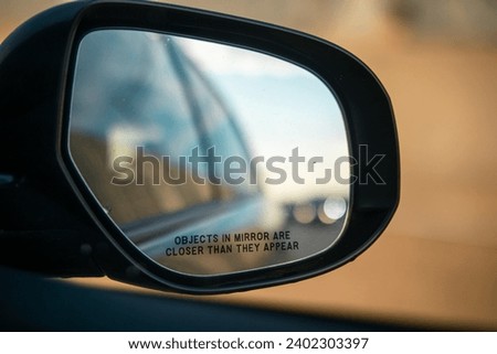 Objects in mirror are closer than they appear