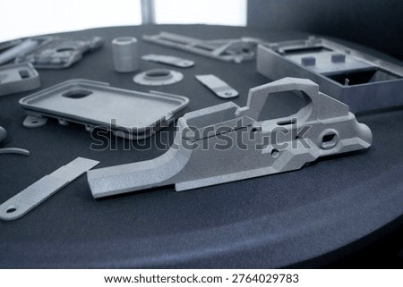 Objects printed on 3D printer. Models created by laser selective sintering of metal powder. 3D using SLM technology. 3D models using SLM technology. Concept modern 3D printing from powder materials
