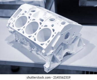 Objects prototype car motor printed on 3d printer from plastic filament close-up. Modern new prototyping technology. Additive automation manufacturing Fused deposition modeling. 3D printing technology - Shutterstock ID 2145562319