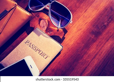 objects for travel isolated on a wooden background - Powered by Shutterstock